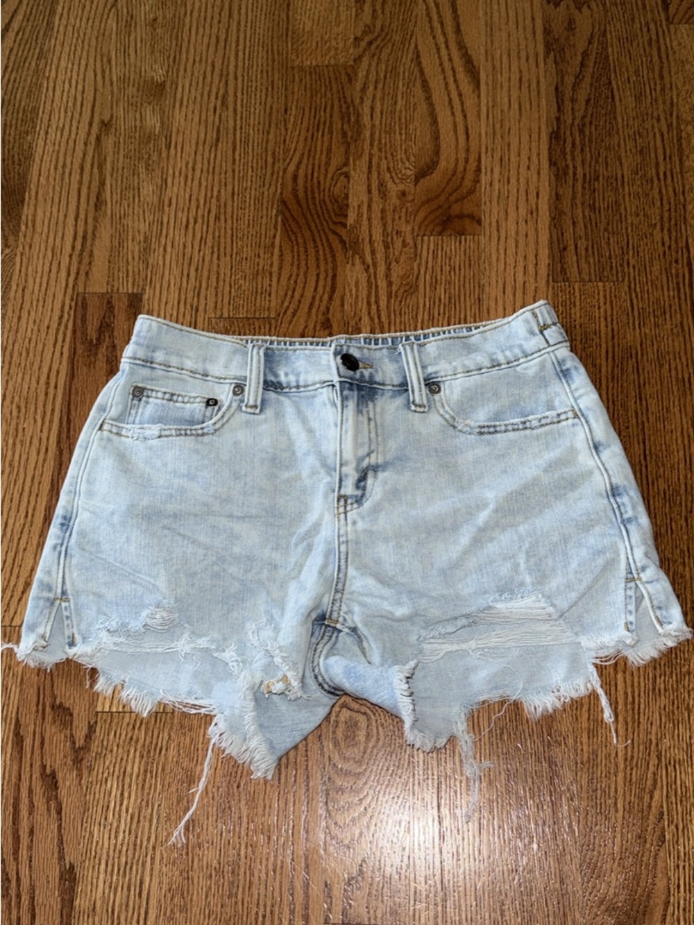 Light Wash Distressed Denim Shorts - Women's